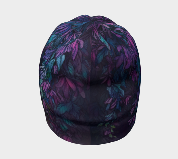 Our Wisteria beanie represents the perfect blend of art, comfort, and style with this unique Purple, Blue and Teal work of art