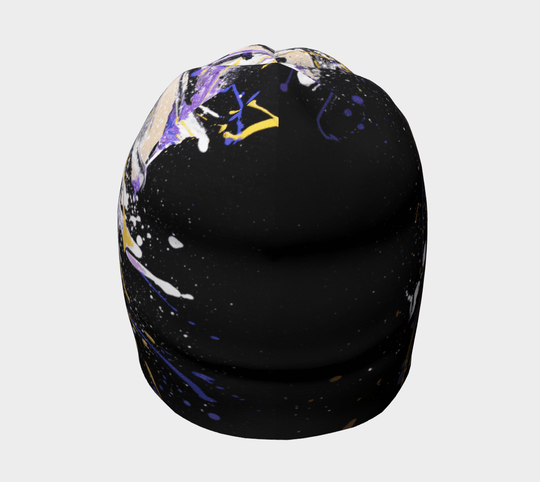 Top view of the Abracadabra Beanie, revealing the full extent of its abstract splatter art design.
