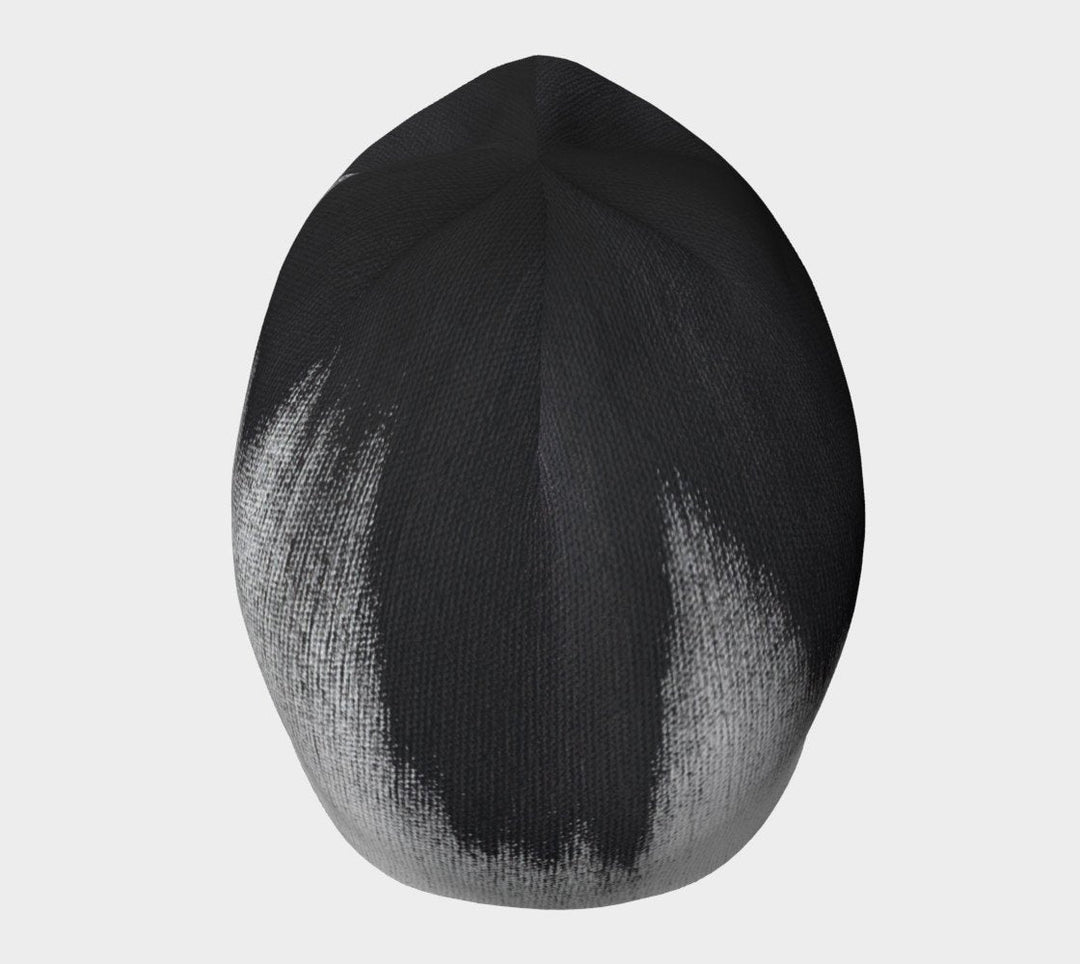 Top view of the abstract brush stroke beanie showing the pattern distribution.
