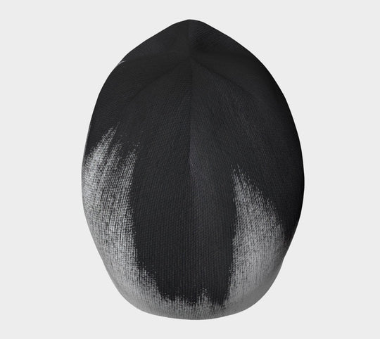 Top view of the abstract brush stroke beanie showing the pattern distribution.