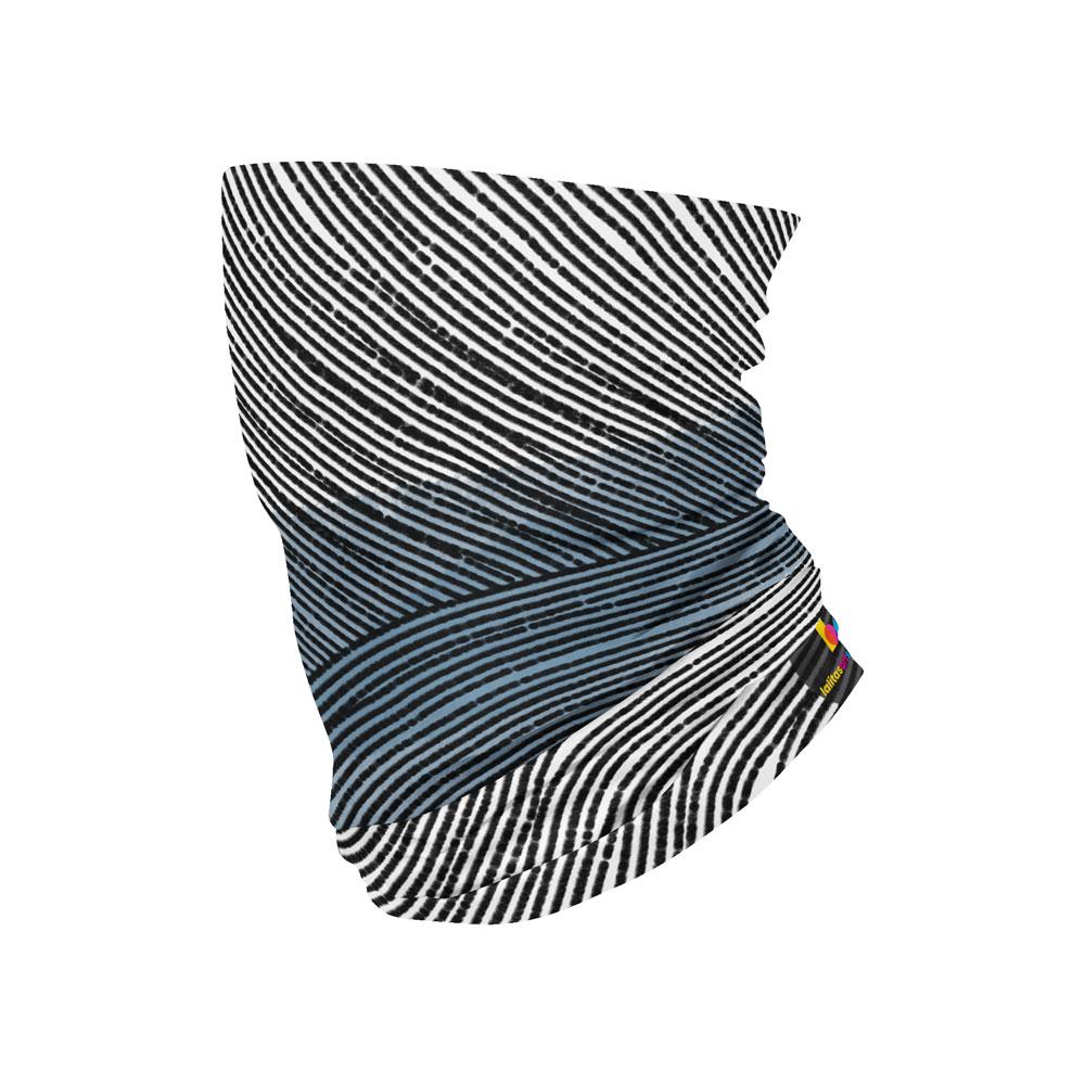 A flat-lay of a multifunctional tube with black and white abstract wavy lines and a blue-grey section.