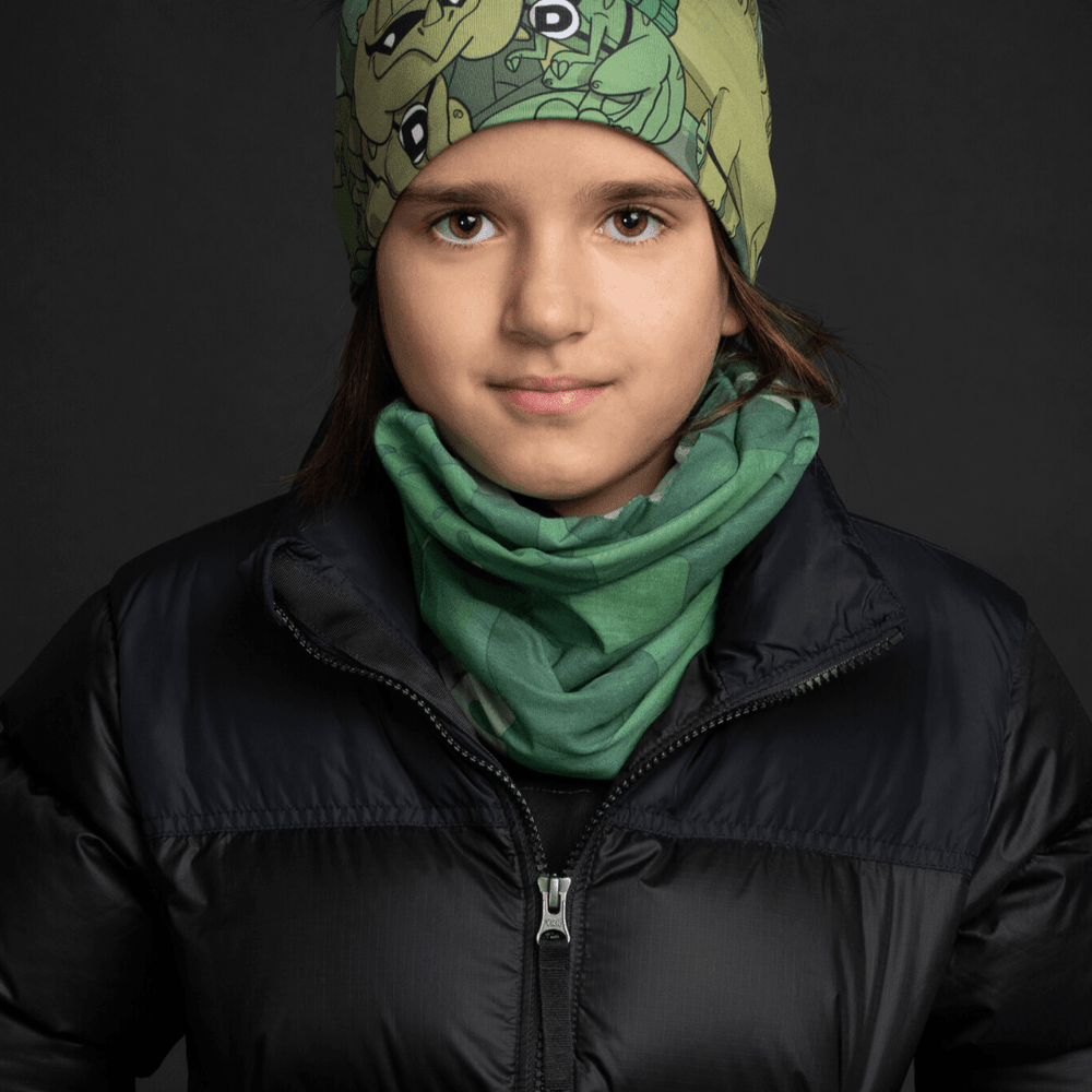 A child wearing a black puffer jacket and a green camouflage neck tube.