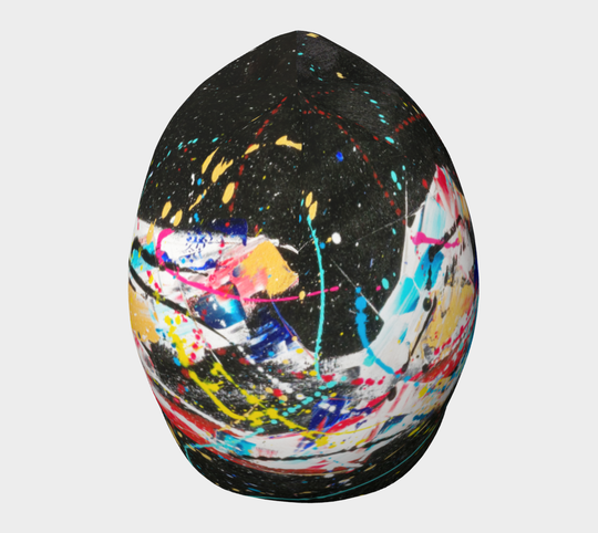 Front view of the black beanie with colorful abstract paint splatters on a black background.
