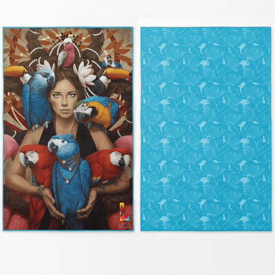 Reversible microfiber towel showing tropical art on one side and blue pattern on the other.
