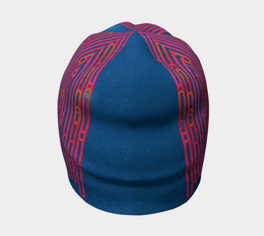 Top view of a blue beanie with a radiating pink and orange linear design.