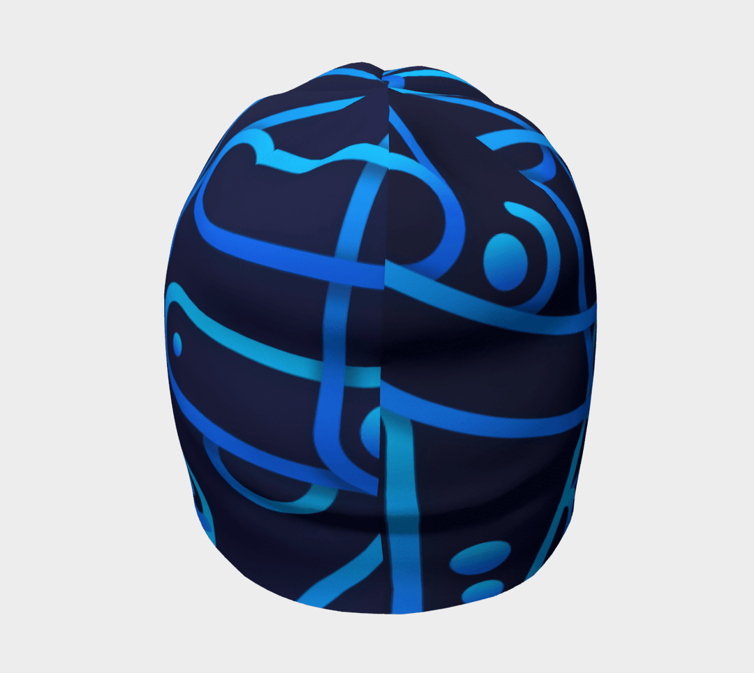 Top view of a dark blue beanie with a repeating abstract geometric pattern in bright blues.