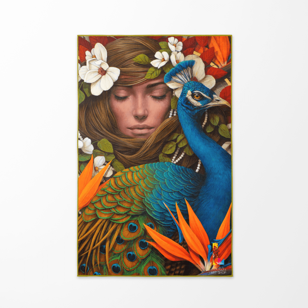 A flat lay of the Chrysalide reversible beach towel with the artistic peacock design facing up.