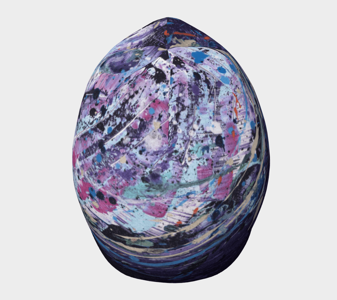 Top-down view of the Cosmic Beanie showcasing its colorful, abstract design.