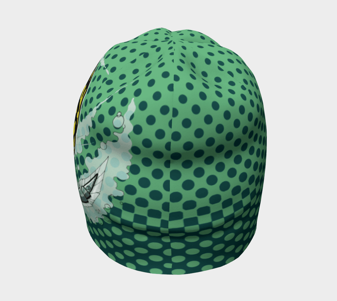 Rear view of the Diving Beetle Beanie, highlighting the green polka dot design and artistic elements.