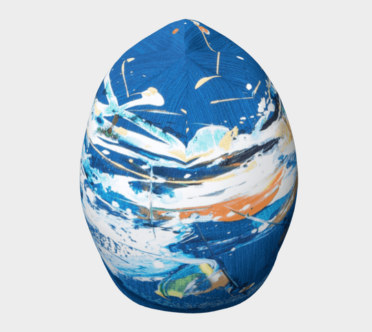 Front view of the blue abstract art beanie, displaying its rounded crown and colourful design.