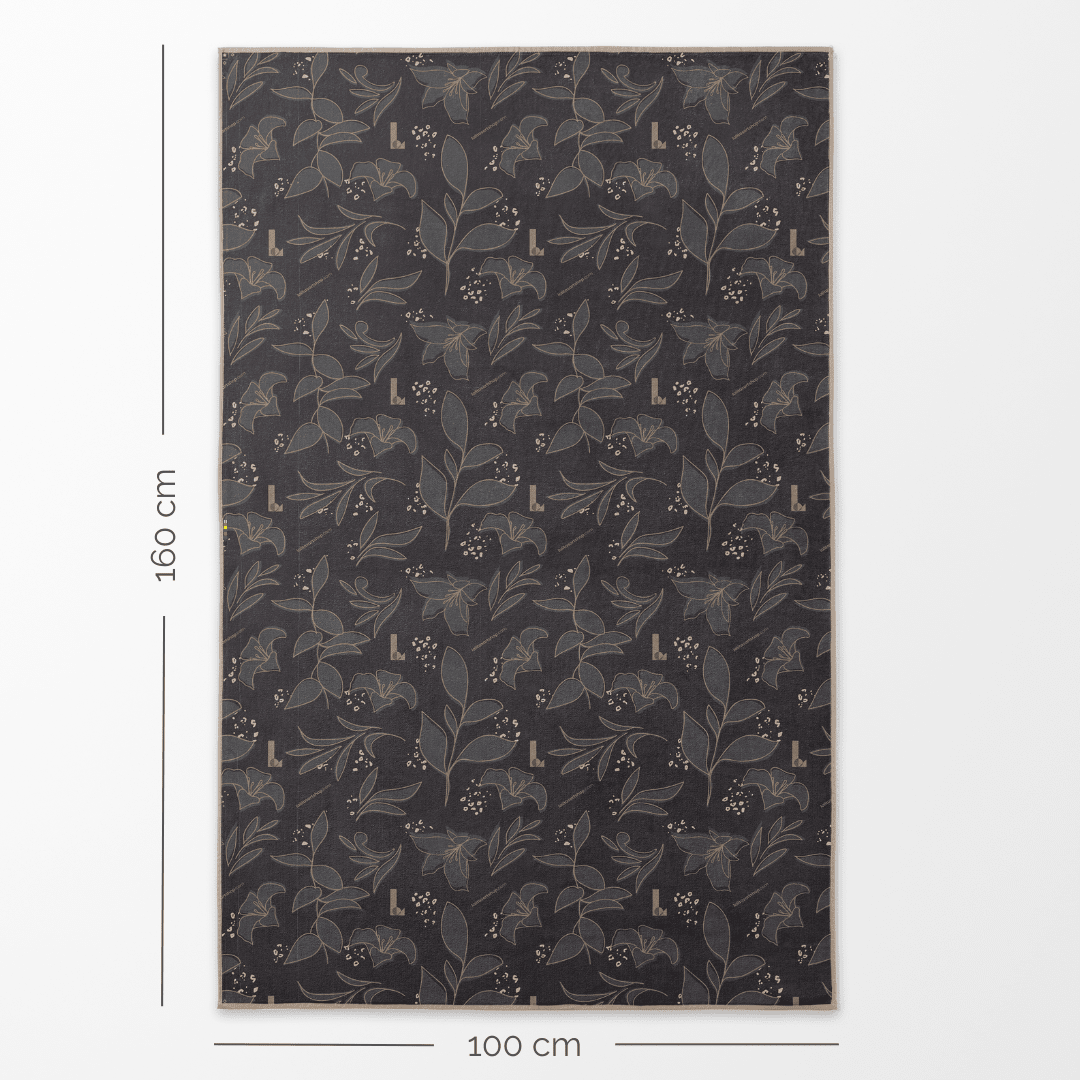 Back side of the Felines XL towel, displaying a dark grey floral pattern with dimensions.