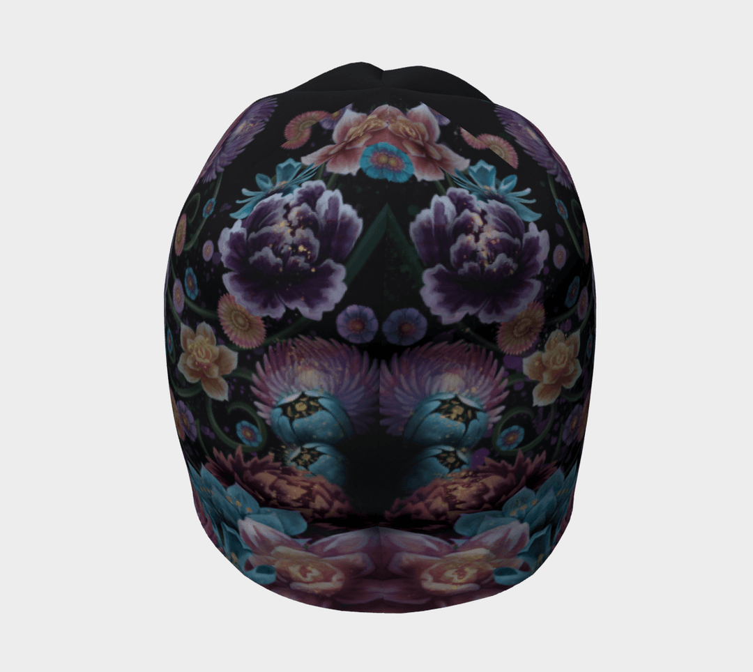 Top view of the beanie, displaying the symmetrical arrangement of floral motifs against a dark background.