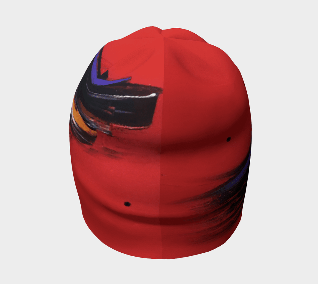 Red abstract art beanie with black and coloured brushstrokes, from the front.