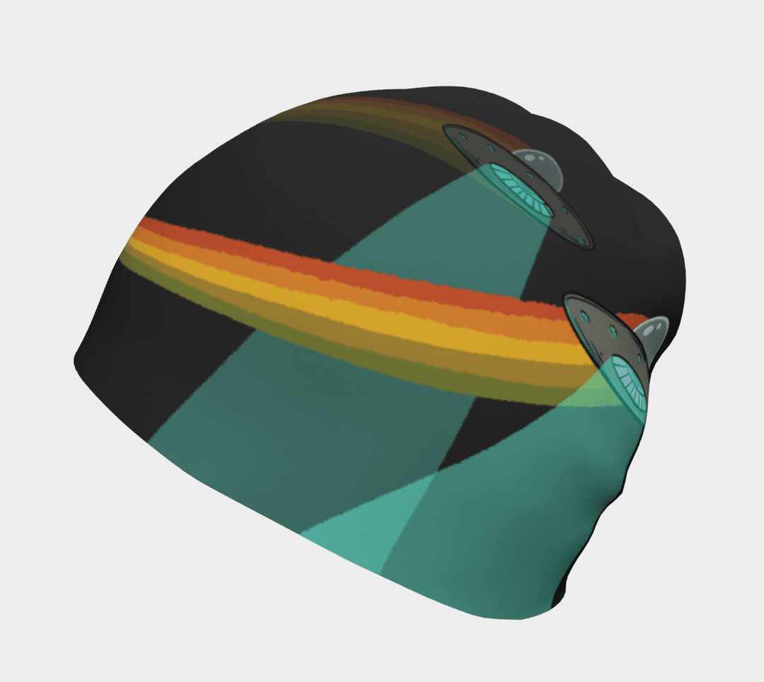 Close-up of a black beanie featuring a flying saucer emitting a beam of light.