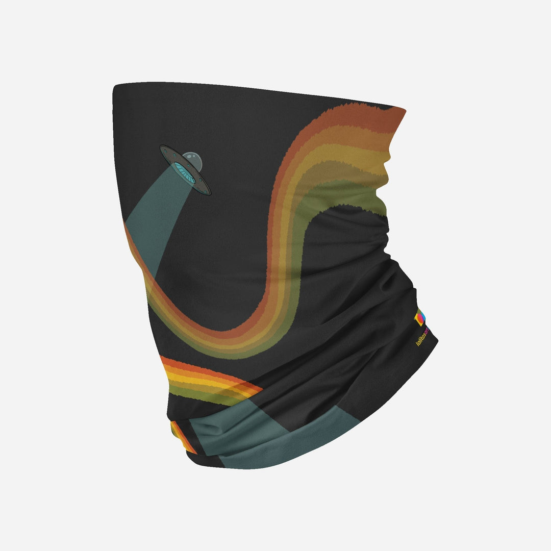 Black neck gaiter featuring a UFO beaming a rainbow onto a dark landscape.