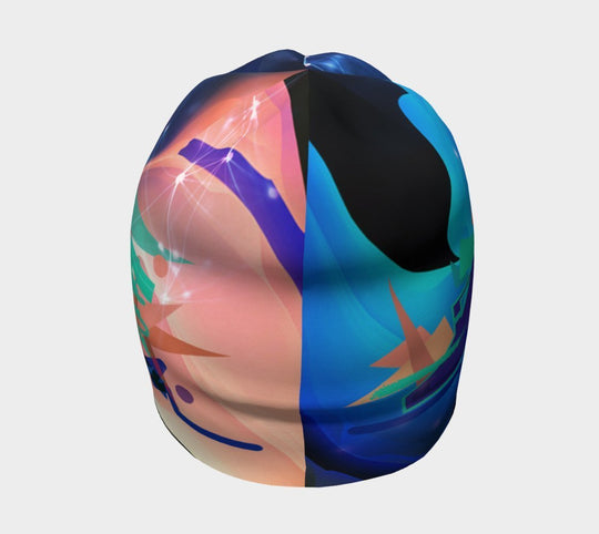 A split view of the Galaxy Beanie, half showing the blue and green side, half showing the pink and orange side.