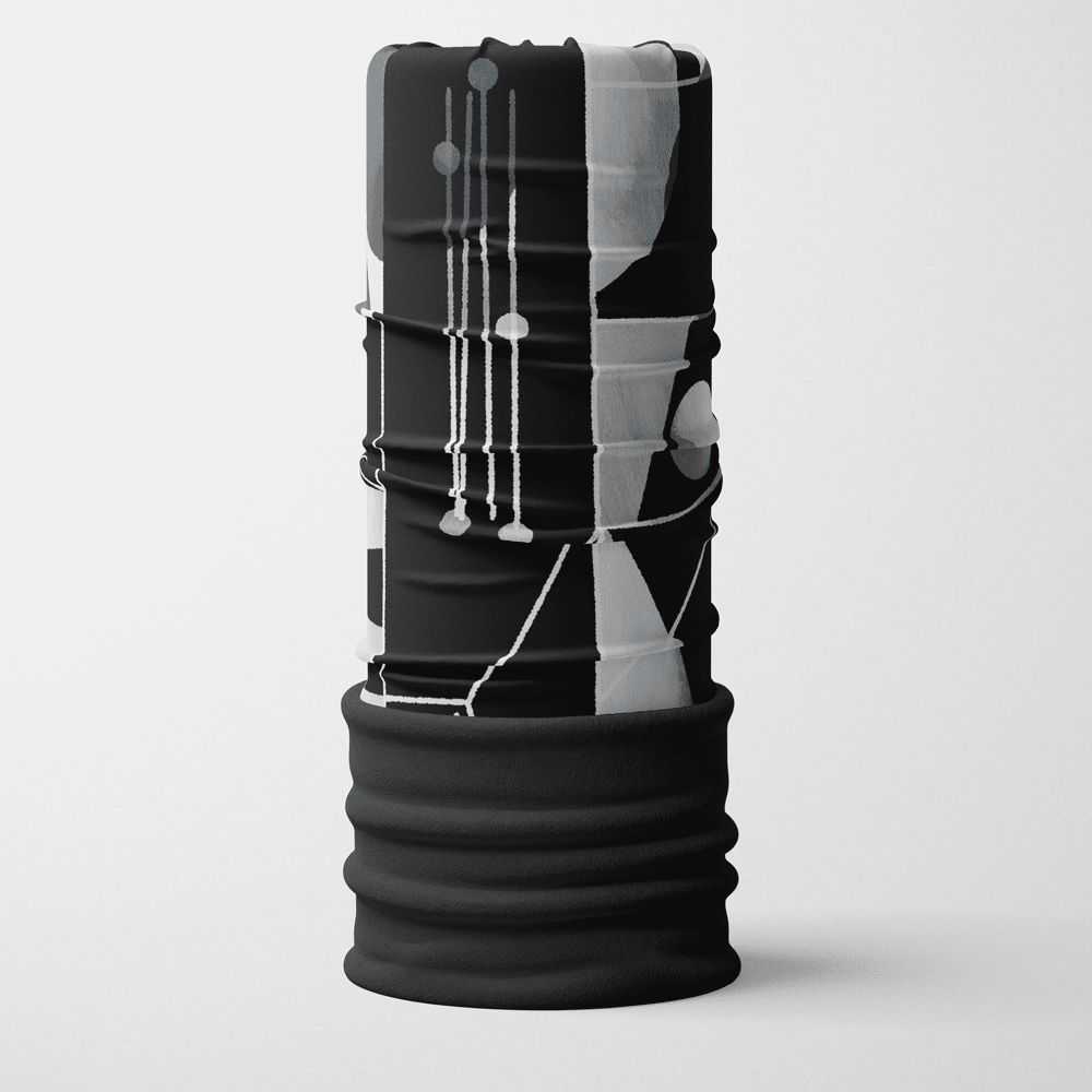 Black and grey abstract geometric print tubular scarf with a black fleece lining on a white background