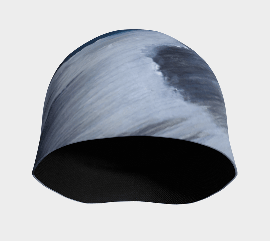 View of the Golden Sea Beanie from the side, revealing its smooth, seamless construction and bamboo lining.