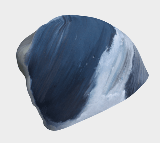 Close-up view of the Golden Sea Beanie, showcasing abstract blue and white brushstrokes.