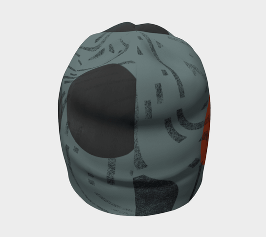 Rear view of the grey beanie showing dark circle and terracotta orange arc across the teal-grey fabric