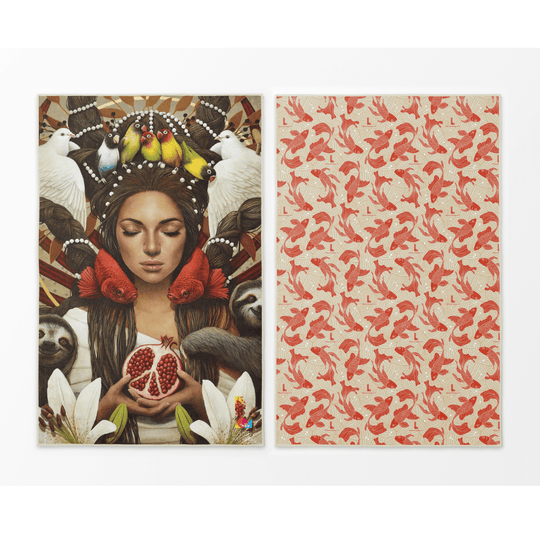 Two sides of the Guerrière Pacifique towel: one with a woman surrounded by animals and nature, the other with a red koi fish pattern.