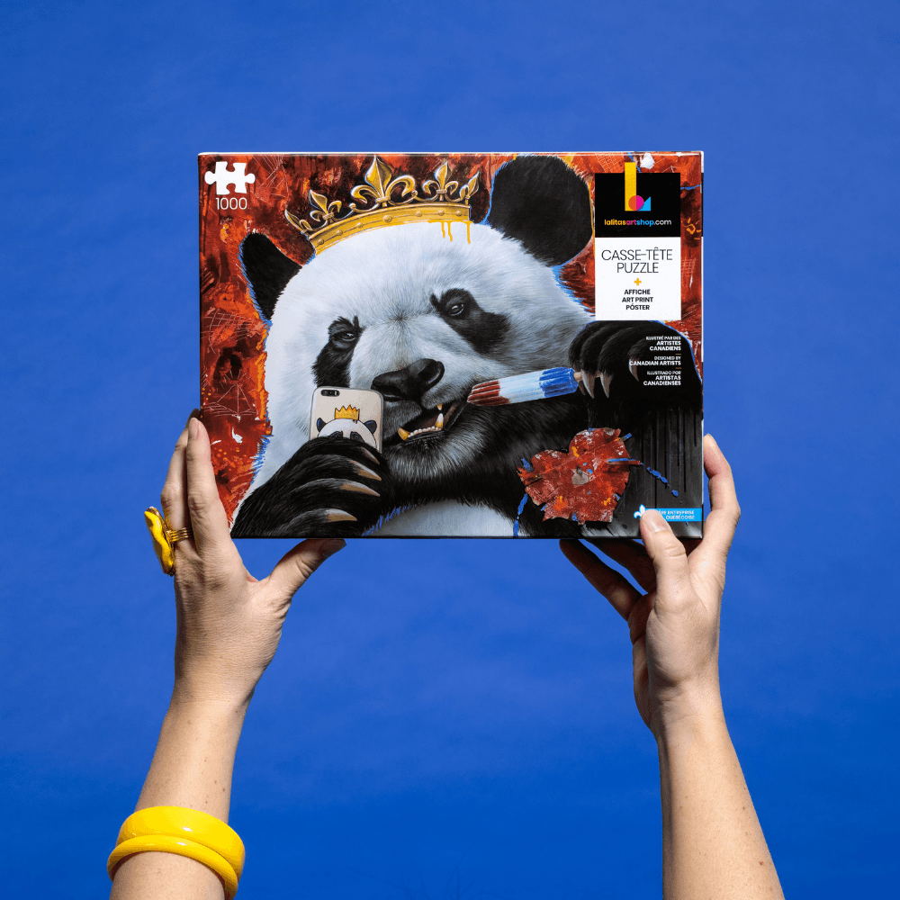 Hands holding up the Selfie Panda 1000-piece jigsaw puzzle box, showcasing the artwork.