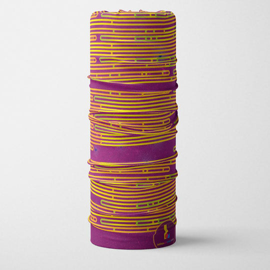 Rolled Magenta Multifunctional Tube with a visible laundry tag featuring the Lalita&