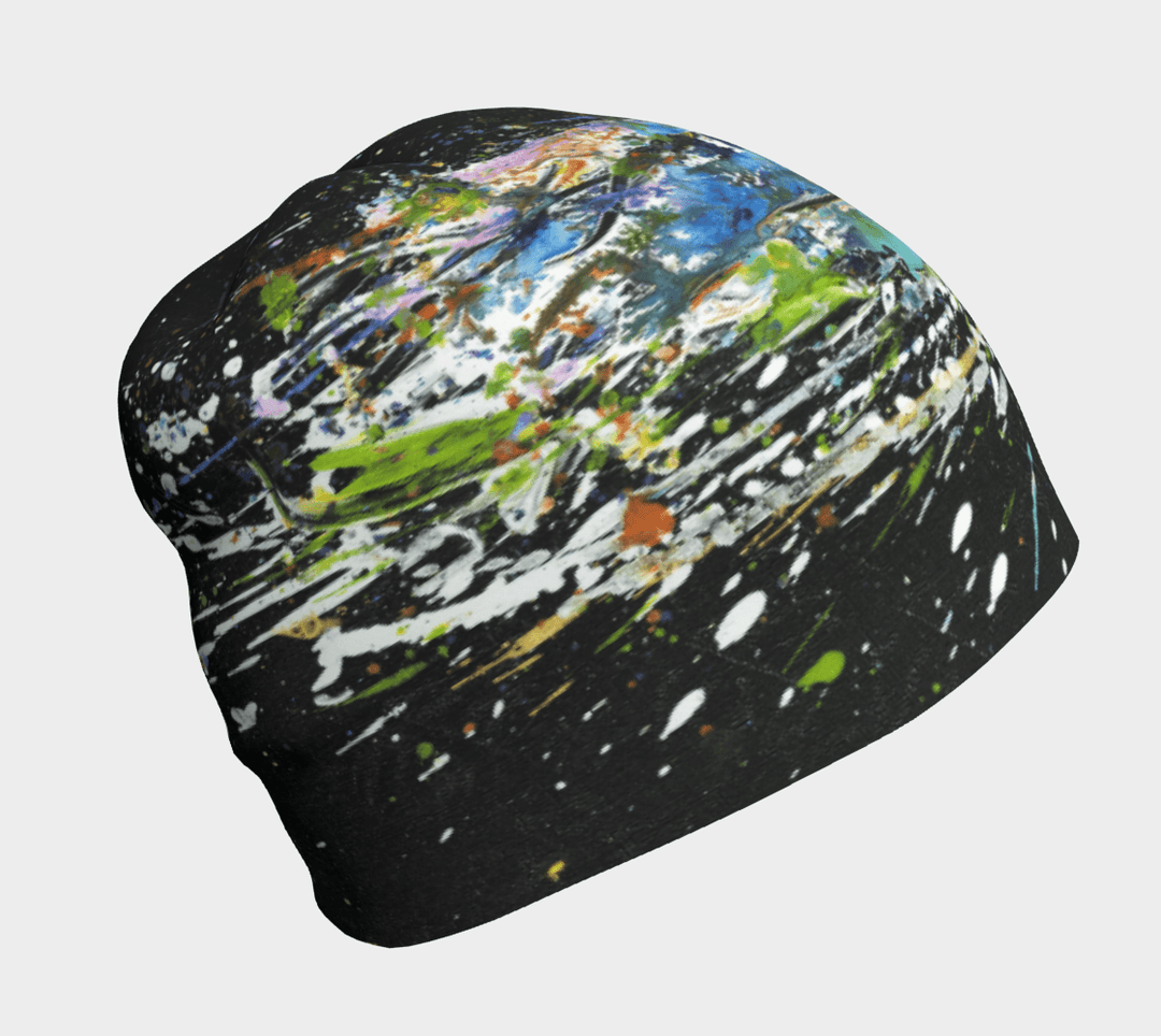 A black beanie with a colourful abstract paint splatter design.
