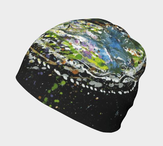 A black beanie with a vibrant, abstract paint splatter design shown from the side.