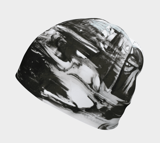 Side view of a black and white abstract pattern beanie.