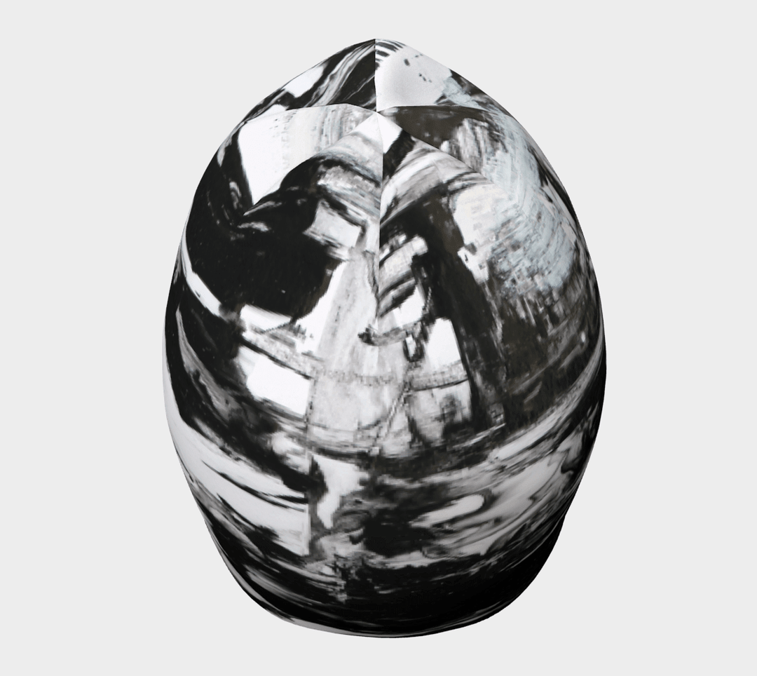 Front view of a black and white abstract pattern beanie, highlighting the pattern&