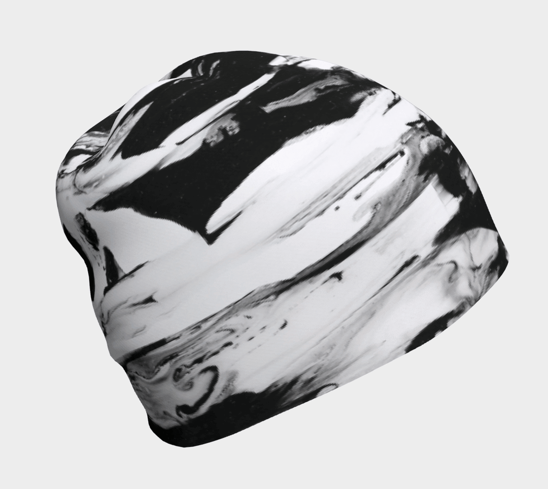 Close-up of a black and white abstract pattern beanie.