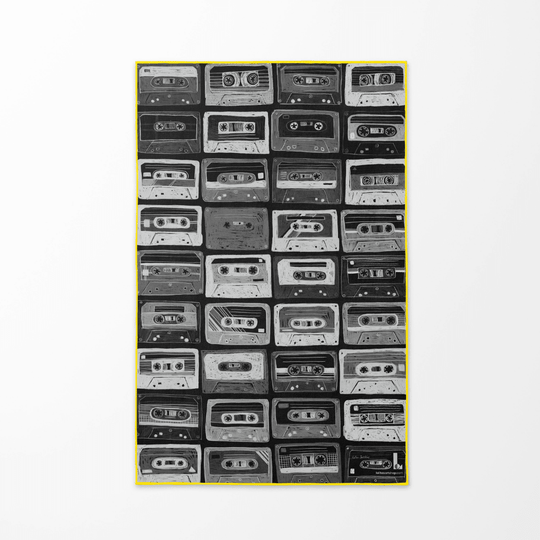 Close-up of the black and white cassette tape pattern on the Mixtapes beach towel.