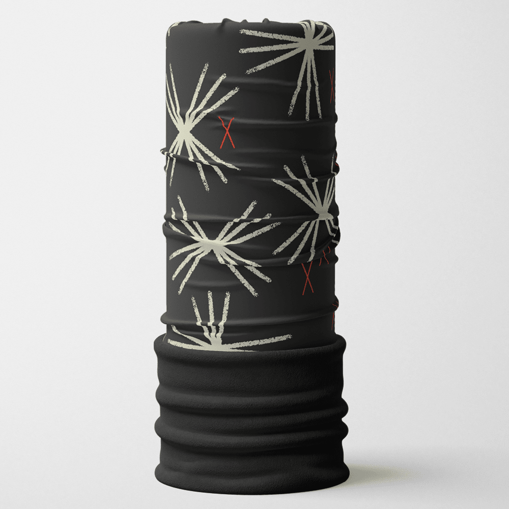 Black multifunctional tube with a white abstract starburst pattern and small red X details, featuring a black ribbed hem.