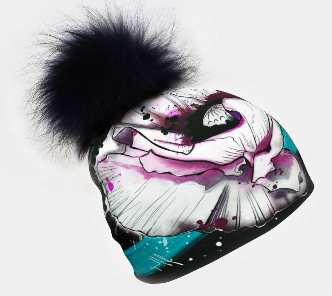 New Poppy Beanie with removable black pom pom showing a close-up of the floral art.