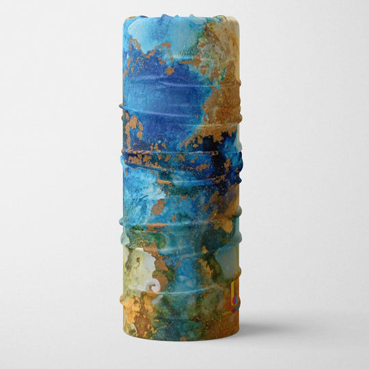 A stand-alone Ocean Marble multifunctional tube showing its seamless construction and abstract blue and gold design.