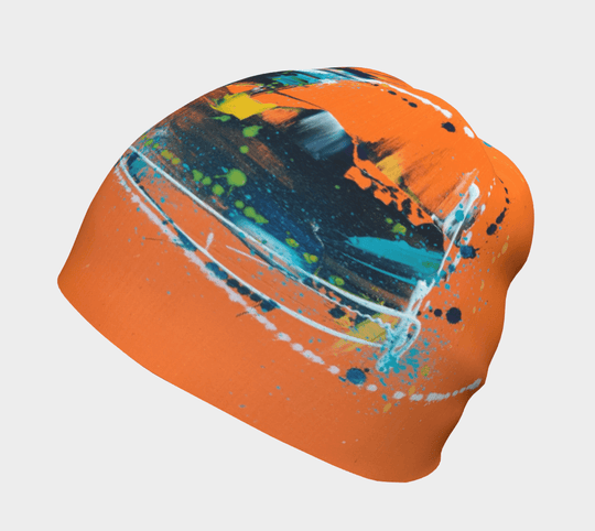 Close-up of the orange beanie showcasing its abstract art design.