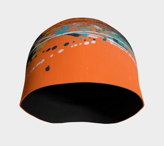 Interior view of the orange abstract beanie, highlighting the black bamboo lining.