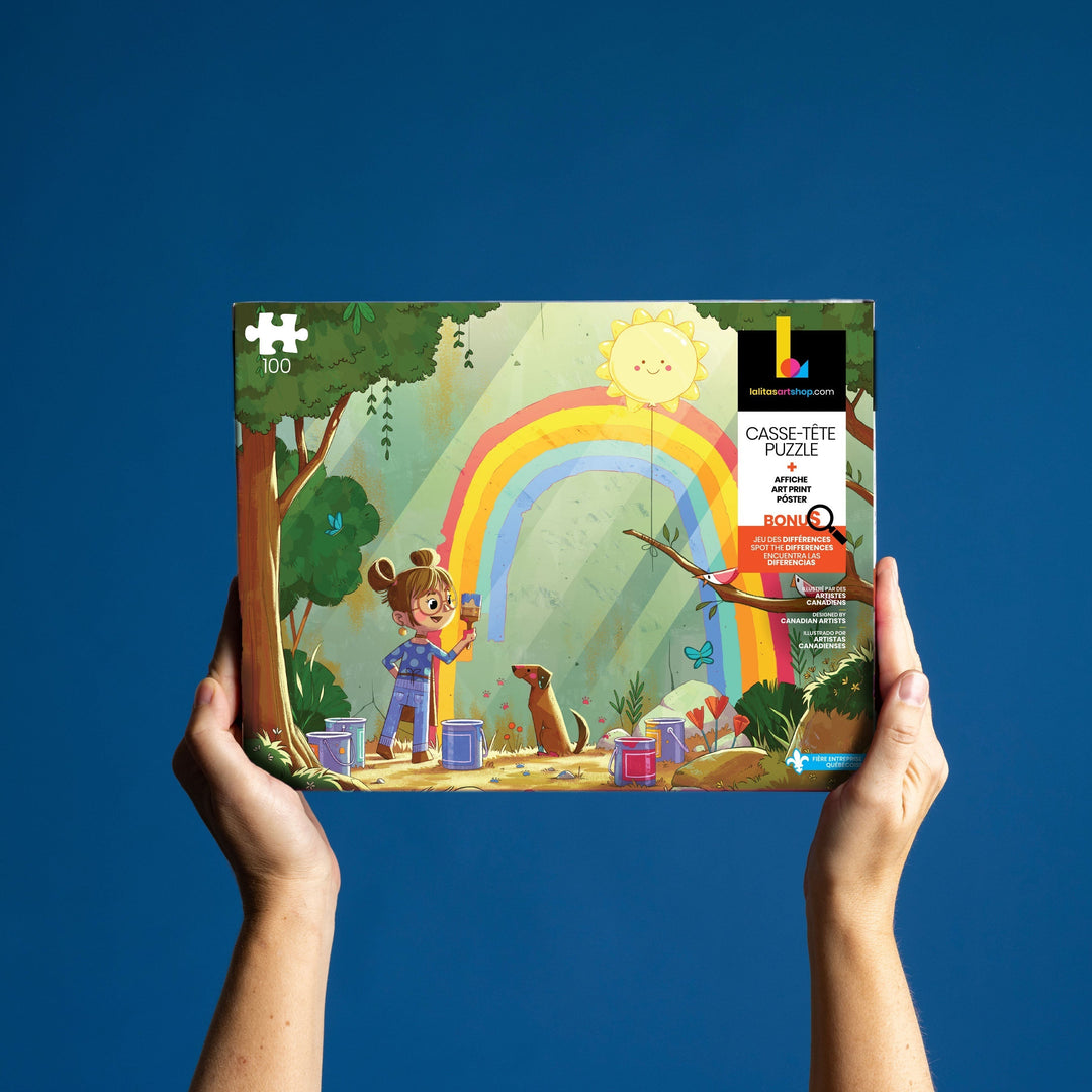 Hands holding the Painting Rainbows 100-piece jigsaw puzzle, showcasing the colourful artwork of a girl and her dog creating a rainbow.