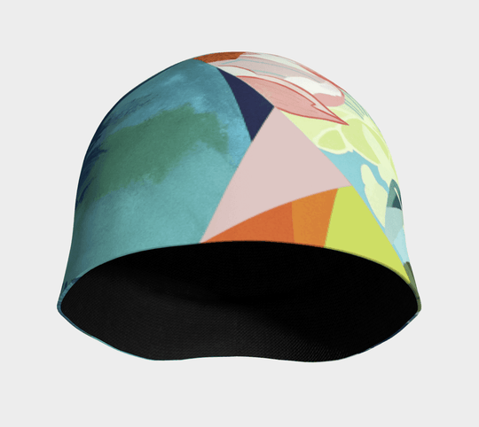 Interior view of a beanie showing the black bamboo lining and colourful exterior print.