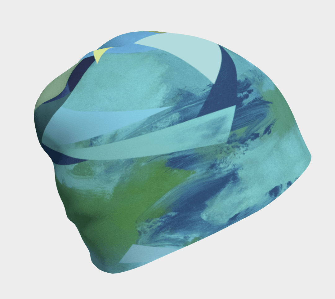 Beanie featuring an abstract geometric pattern in shades of blue and green.