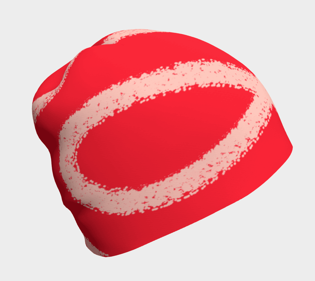 Red beanie with abstract peach-coloured swirl pattern, front view.