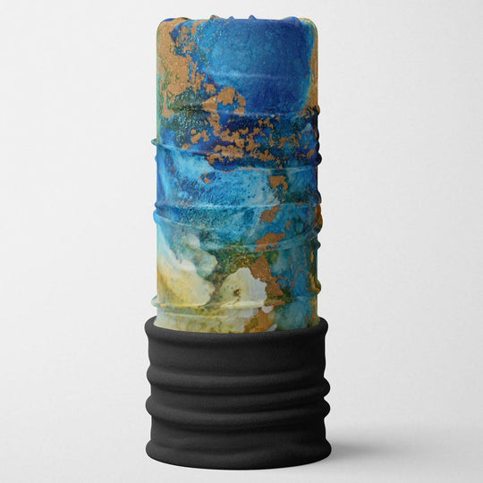 A POLAR Ocean Marble multifunctional neck tube showing abstract blue, green, and gold marbling against a white background.