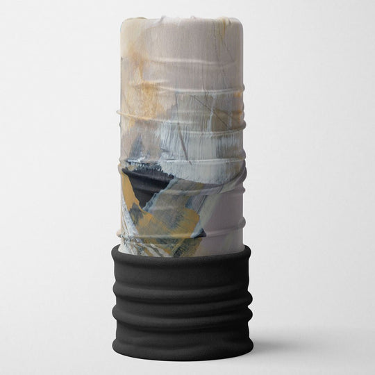 Abstract art print fabric tube with a black polar fleece base, standing upright.