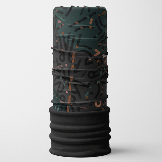 A grey multifunctional neck tube with a black fleece bottom, featuring a dark grey abstract pattern with orange and tan accents.