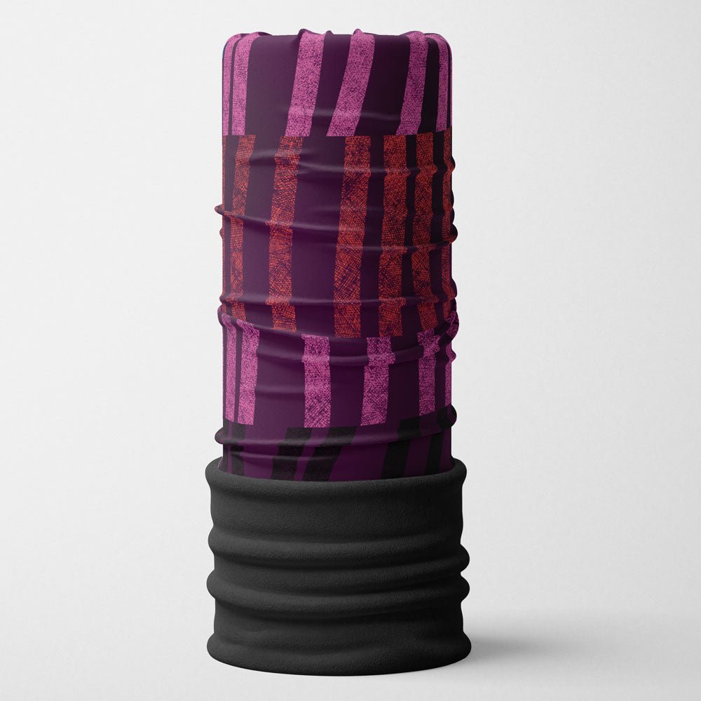 Purple multifunctional neck tube with pink and red stripes, featuring a black fleece lining.