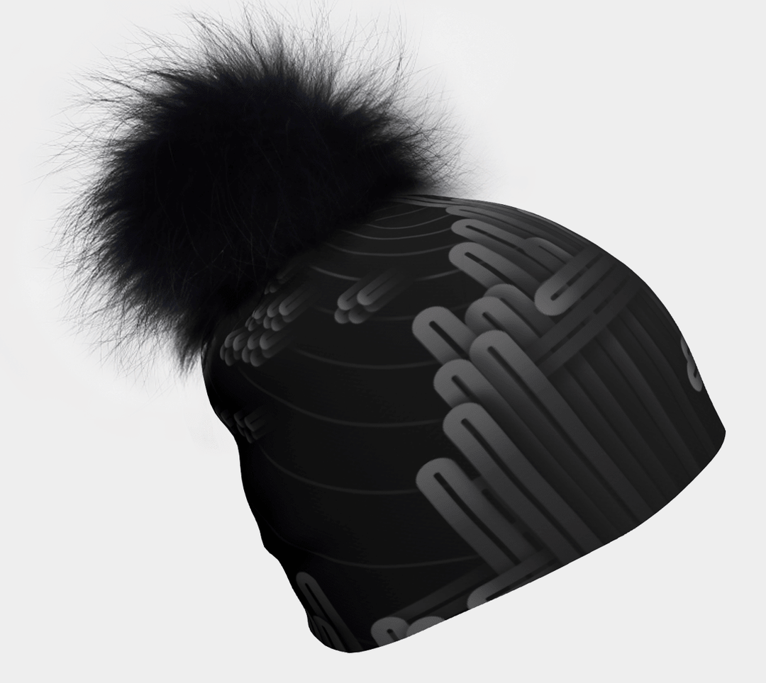 Black Radio City Beanie with a large, fluffy black detachable pompom against a white background.