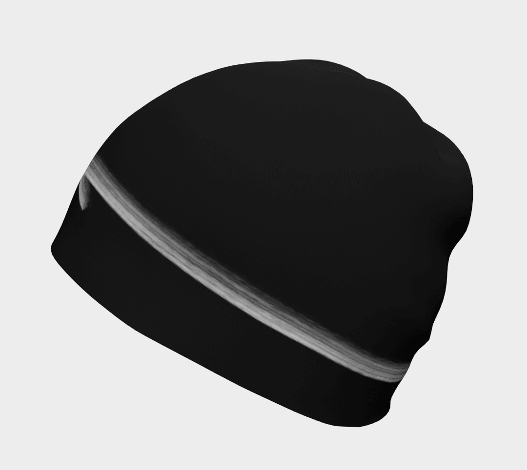 Black beanie with a white abstract brushstroke design shown from a side angle.