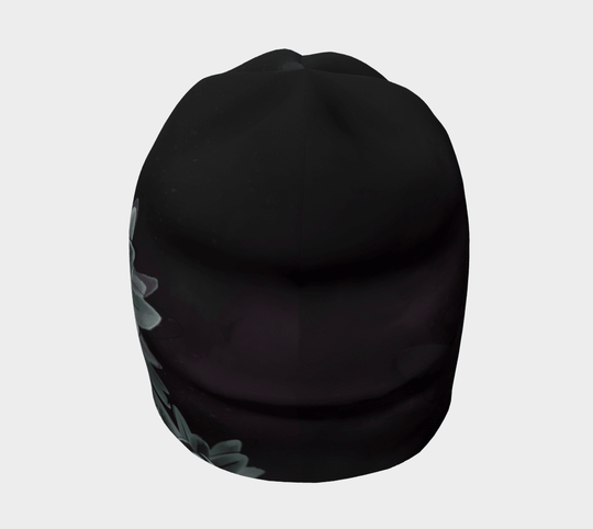 A black beanie with a stylized succulent flower graphic on the side, viewed from the front.