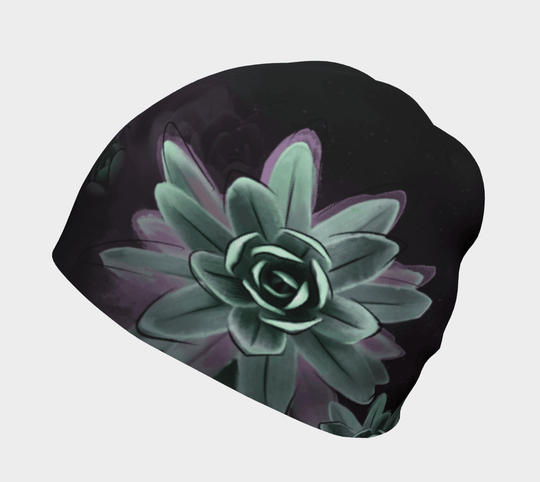 Black beanie featuring a large, pale green succulent flower graphic with subtle pink and purple undertones.